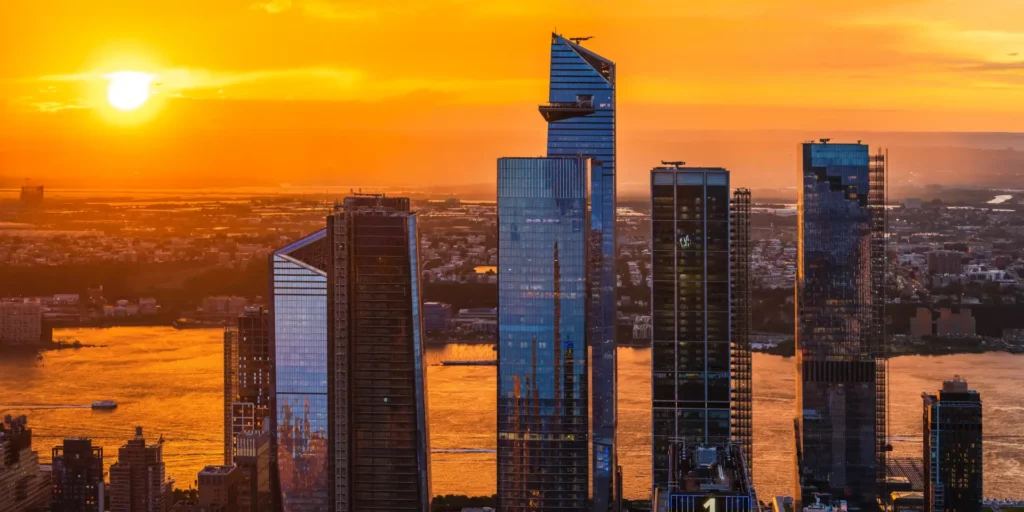 New York skyscrapers at sunset with orange sky